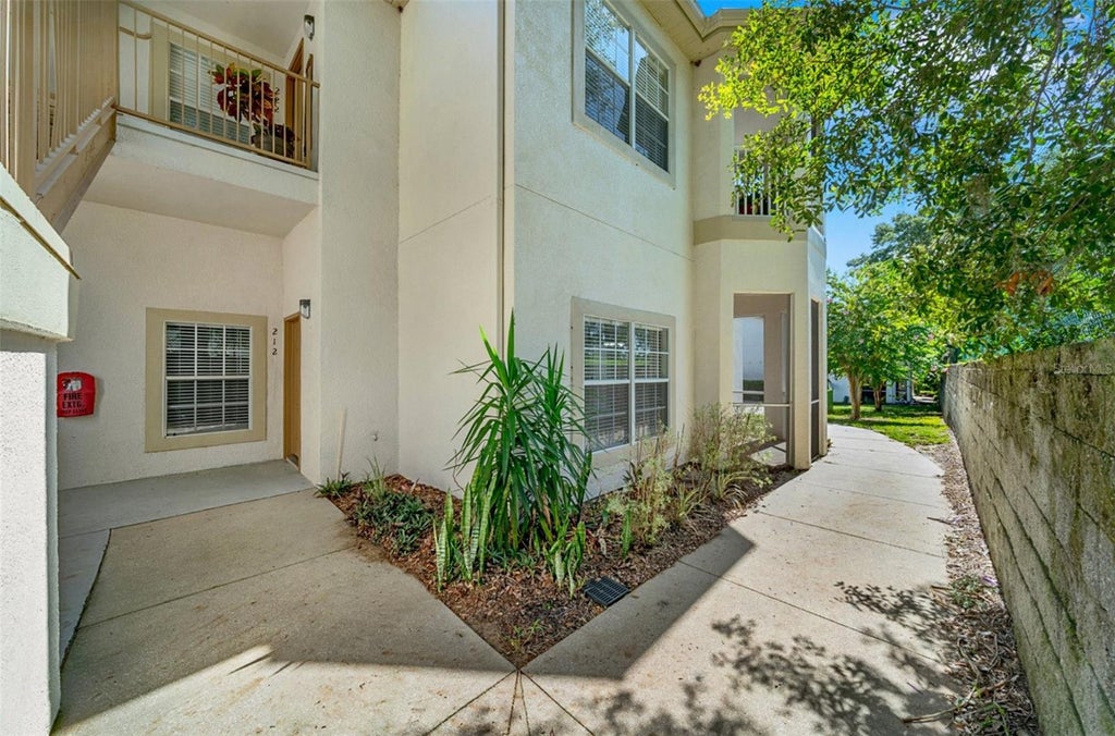 Photo of 970 N Spring Garden Avenue #212, Deland, FL 32720 (MLS # V4950346)