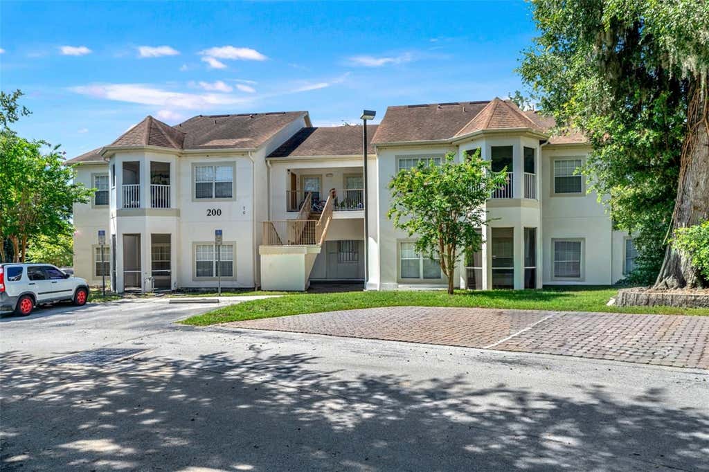 Photo of 970 N Spring Garden Avenue #212, Deland, FL 32720 (MLS # V4950346)