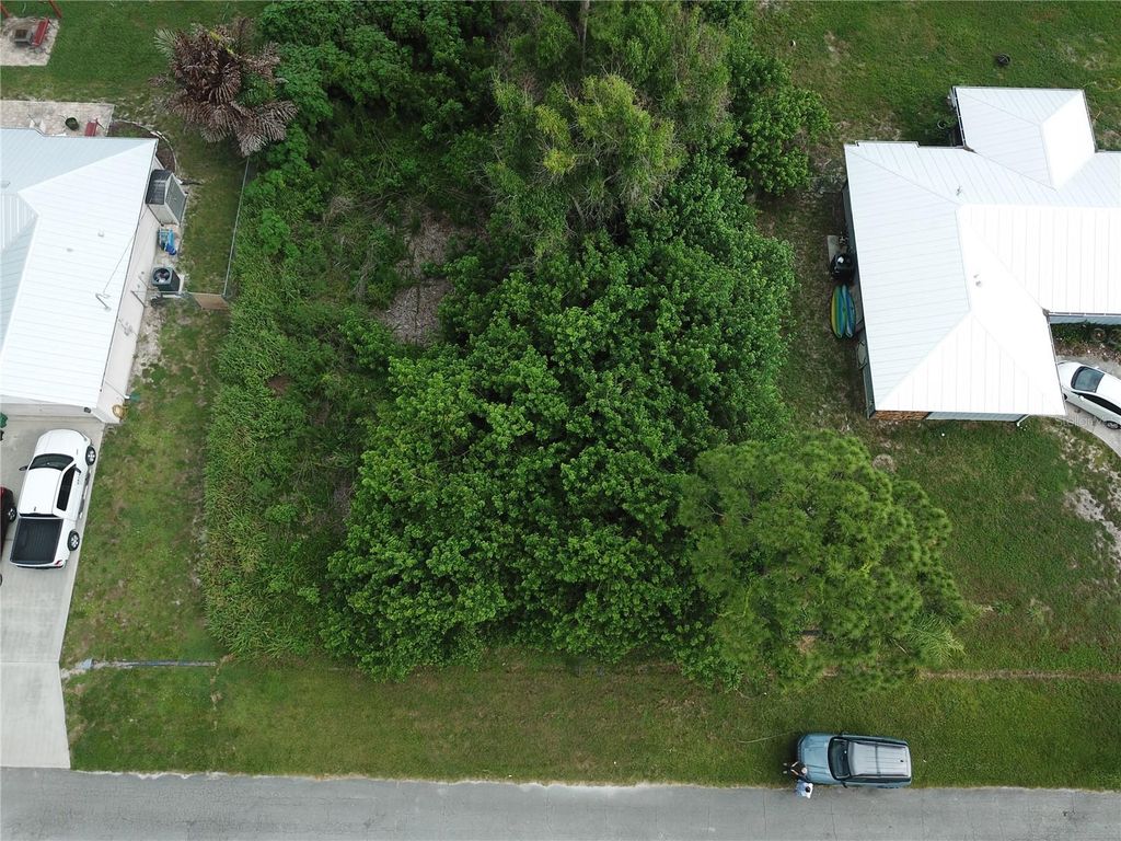 Photo of 1743 SE Manth Lane, Port Saint Lucie, FL 34983 (MLS # O6416861)