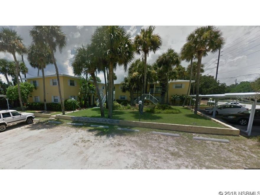 Lovely 2 bedroom 1 bath condo located right in the heart of beachside New Smyrna. Walk to shopping, dining and the beach! Terrazzo flooring throughout with tile in the kitchen. Plantation shutters in the living room. Full kitchen. One covered parking space assigned. Coin Operated washer/dryers on site. Unfurnished. Front and back patio to enjoy!