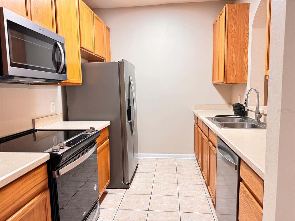 Photo of 6214 Stevenson Drive #107, Orlando, FL 32835 (MLS # O6432245)