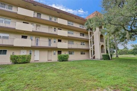Photo of 6260 S Falls Circle Drive #311, Lauderhill, FL 33319 (MLS # TB8462060)