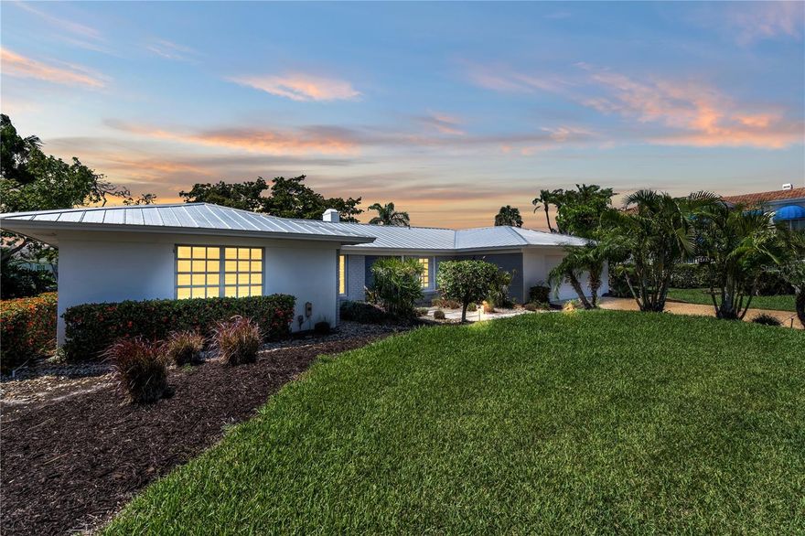 Welcome to Longboat Key waterfront living! This waterfront home is located on a canal on Longboat Key, just one lot away from the bay with open waters and no bridges. A deep water canal lot ideally situated in the desirable community of Country Club Shores on south Longboat Key. This traditional split floor plan offers owners privacy when company comes to stay. The large, screened pool deck covers a heated pool and is accessible from the master bedroom, and the living and dining rooms. The home is the perfect spot for fishing, boating, or simply spending your time outside by the pool. Turnkey furnished, this 3-bedroom home also includes a private 15x30ft pool and deeded beach access. The home underwent major renovations in 2019 including a pool and metal roof. Plus, there's a dock featuring upgraded decking, and two boat lifts (lifts can hold up to 14,000 lbs and 20,000 lbs resp)  – perfect for enjoying all of your favorite water activities. The home was also a part-time rental. Whether you’re looking to enjoy this incredible property as-is or are interested in building new, Don’t miss out on this opportunity.