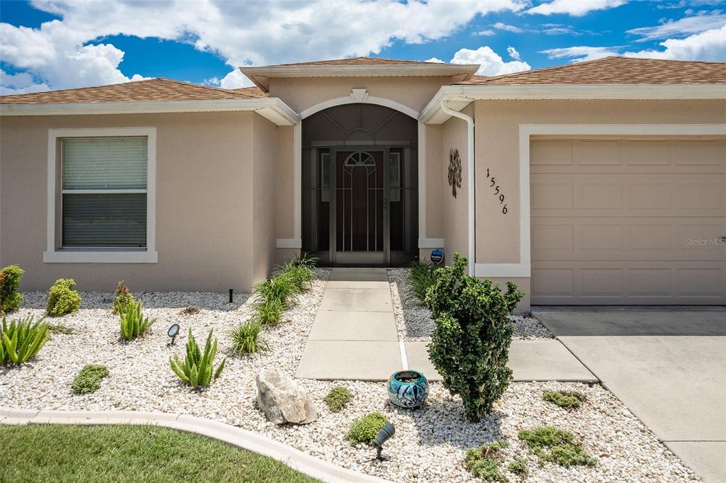 Photo of 15596 SW 13th Circle, Ocala, FL 34473 (MLS # OM724257)