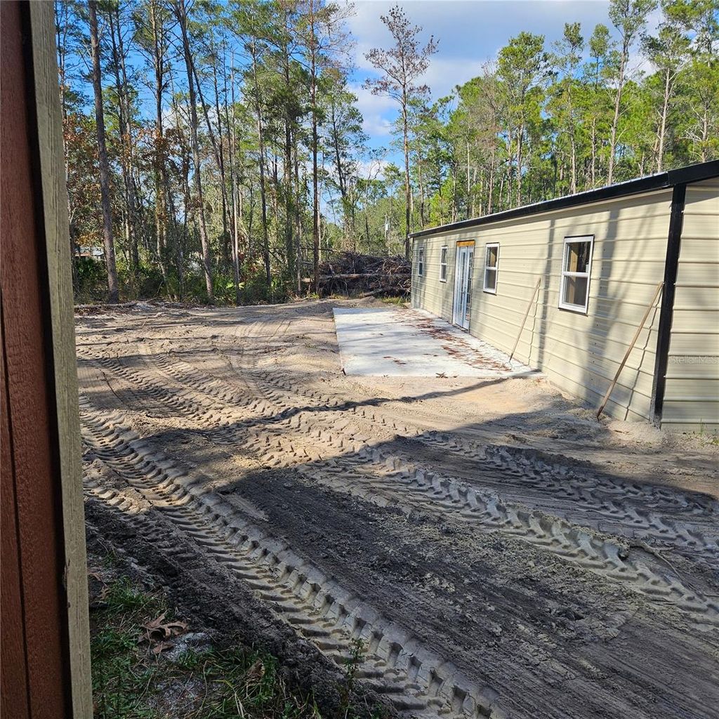 Photo of 1255 Black Bear Ranch Trail, Pierson, FL 32180 (MLS # O6379911)