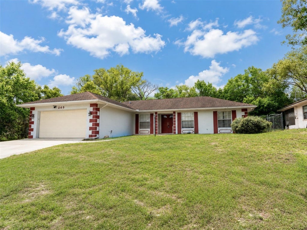 Photo of 265 Clearfield Avenue, Spring Hill, FL 34606 (MLS # G5113014)