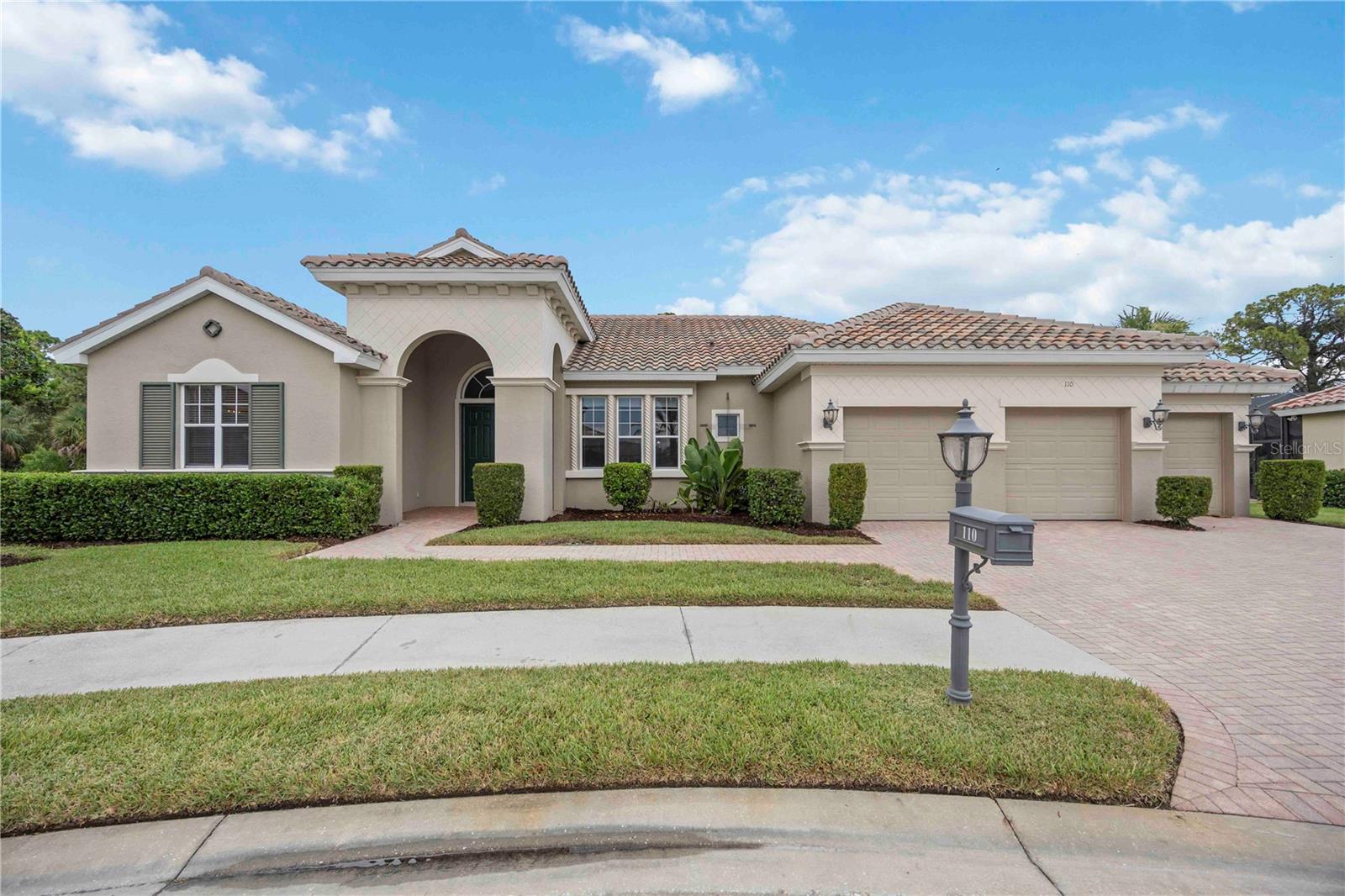 Absolutely stunning and move-in ready! This 4 bedroom, 3 bathroom pool home is nestled on nearly half an acre in the highly sought-after Venetian Golf & River Club—a peaceful setting surrounded by lush landscaping. With a spacious 3-car garage, there’s plenty of room for vehicles, a golf cart, or even a small boat or water toys! As you enter, you'll be welcomed by a pillared entryway that leads into a bright and elegant living room with tranquil views of the screened lanai and pool area. The formal dining room boasts classic crown molding, perfect for entertaining in style and hosting holiday dinners. The chef’s kitchen is the heart of the home, featuring granite countertops, stainless steel appliances, a walk-in pantry, and a charming breakfast nook with aquarium-style windows. A spacious countertop bar provides additional seating for casual meals or gatherings. The family room is oversized and includes built-in cabinetry for entertainment and overlooks the serene backyard. The primary suite is a spa-like experience of its own with a separate pillared sitting area, two walk-in closets, and a luxurious en-suite bath with dual vanities, a walk-in shower, and a soaking tub for ultimate relaxation. The split floor plan offers two generously sized guest bedrooms for overnight visitors, a home office, or hobby space. The bonus room offers exceptional versatility, featuring an en-suite bath, a wet bar with granite countertops and a mini-fridge, as well as a built-in Murphy bed—making it the perfect space for an in-law suite, guest quarters, or entertainment zone. Step outside to your enlarged paver patio, complete with a sparkling pool and spa, where you can host many summer BBQs or relax under the stars with a glass of wine. The generous backyard sets the scene for a relaxed, outdoor retreat with room for pets to roam, space to garden, and a preserve view that enhances your sense of seclusion and escape. The Venetian Golf & River Club offers a true resort-style lifestyle, featuring 18 holes of championship golf, two sparkling pools, six Har-Tru tennis courts, a state-of-the-art fitness center, fine dining, scenic nature trails, and exclusive access to the River Club. Plus, this prime location keeps you close to everyday essentials, shopping, dining, and more—everything you need is right at your fingertips! This rare gem checks every box. Don't miss your chance to live in one of the area's most desirable communities—schedule your showing today!