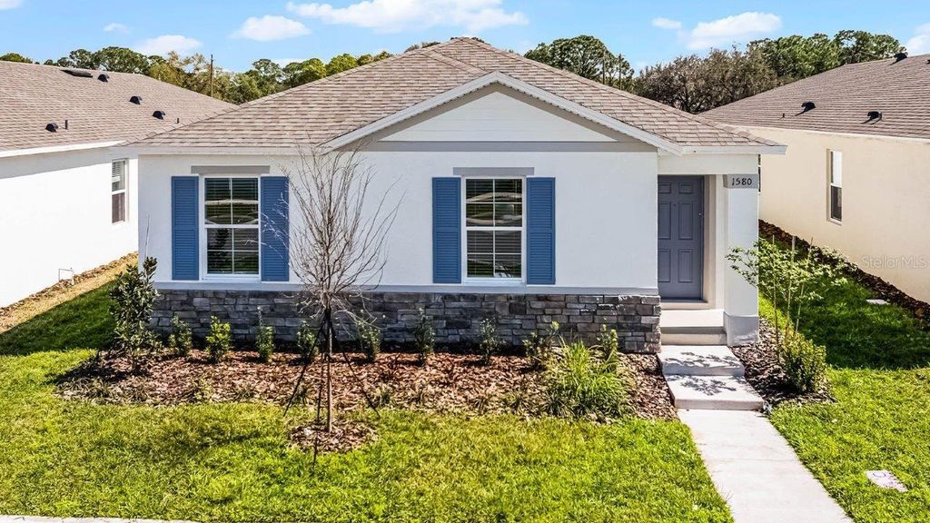 Photo of 1628 Hummingbird Road, Winter Haven, FL 33884 (MLS # O6423328)