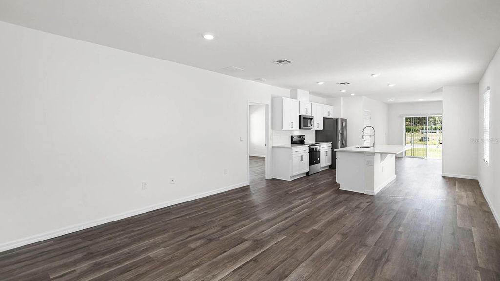 Photo of 1628 Hummingbird Road, Winter Haven, FL 33884 (MLS # O6423328)