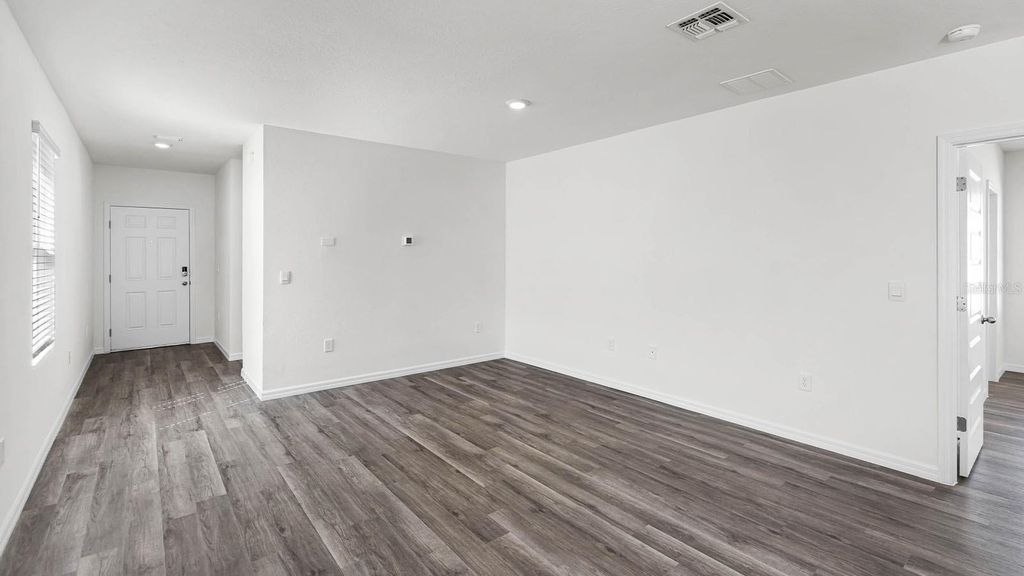 Photo of 1628 Hummingbird Road, Winter Haven, FL 33884 (MLS # O6423328)