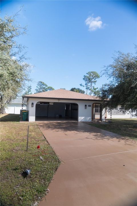 Photo of 2224 Tinker Street, Port Charlotte, FL 33948 (MLS # A4671729)