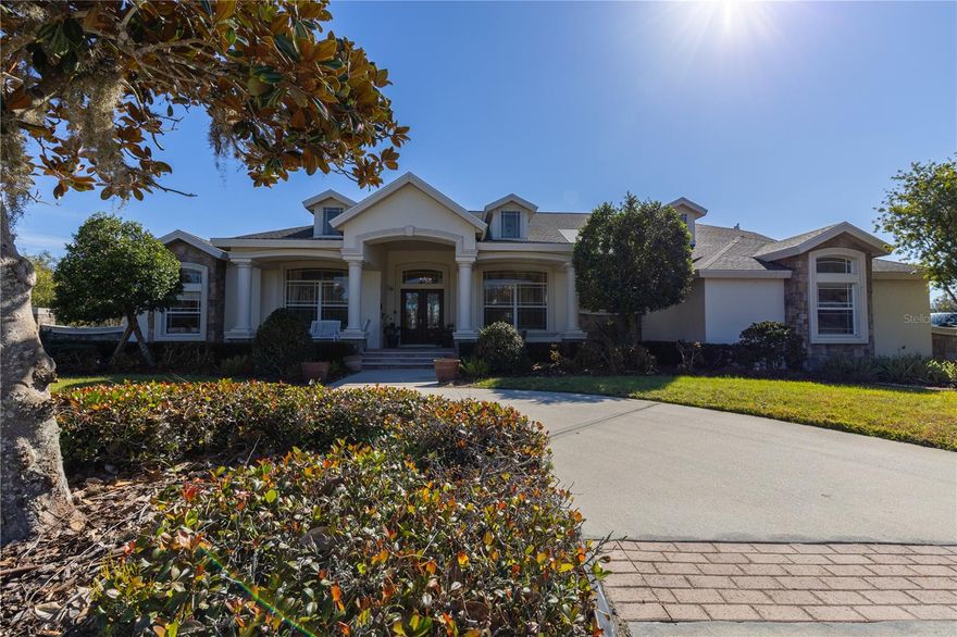 A sprawling 6,349 sq. ft. luxury residence set on 5 pristine acres, this exceptional equestrian estate blends refined living, privacy, and country elegance within the exclusive, gated 5-home equestrian community of Canterfield Farms. Thoughtfully designed for both grand entertaining and everyday comfort, this home features four bedrooms, five baths, four living rooms, a home movie theater, executive office, exercise/flex room, and abundant storage throughout.
A dramatic formal entry welcomes you with polished travertine marble floors, soaring 12’ coffered and inlaid wood-beam ceilings, and a striking double-sided fireplace. To the right, the formal dining room is anchored by a radiant crystal chandelier; to the left, an impressive executive office offers a quiet retreat.
The chef’s kitchen is the heart of the home, showcasing high ceilings, two sinks, a pot filler, and generous prep and storage space. It flows seamlessly into the expansive great room, creating an ideal setting for gatherings. The first-floor primary suite is a true sanctuary, featuring a private glass atrium, rich wood floors, oversized tub, walk-in glassed shower, dual vanities, and a double walk-in closet.
With four distinct family rooms, there is space for every lifestyle need—from relaxation to recreation. All bedrooms are on the first floor.  Two guest rooms have a Jack & Jill bathroom with separate double vanities and a shared workspace. The fourth guest room or in-law suite is in a private cove with adjacent full bath and private living room.  The home movie theater with half bath elevates entertainment to a cinematic experience.
Outdoor living is equally captivating: a resort-style pool, gazebo overlooking the serene pond and fountain, and a cozy fire pit create a peaceful, picturesque environment.  For the horses or workshop needs there is a 3-stall concrete block barn, tack room, and four-car carport. 
Located in this gated community is a private equestrian center with boarding and training facilities. Nearby, miles of scenic riding and walking trails wind through Triple Creek Nature Preserve, Balm Boyette Scrub Preserve, and FishHawk Nature Preserve, offering endless outdoor adventures. Top-rated schools and convenient access to major roadways further enhance the appeal of this exceptional location.
Experience the rare combination of luxury, acreage, and equestrian living. Contact us today to schedule your private tour.