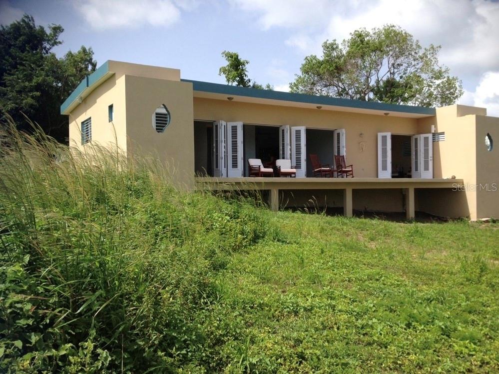 Casa Vieques is your Tropical Sanctuary with spectacular ocean views. Perched on an exquisite acreage, the home offers privacy and a tranquil environment surrounded by the beauty of nature. Casa Vieques' construction was the envy of the neighborhood as it survived a Category 5 several years ago with no damage and only required a bit of painting on one exterior wall.
Nestled on a tranquil acreage on the Southside of Vieques Island, Casa Vieques is a stunning two-bedroom, two-bathroom home offering breathtaking ocean views from every room. The natural light and ventilation are an integral part of island living contributing to a healthier living environment, with lower energy costs. Constructed with insulated concrete forms, the 11-inch thick walls provide superior energy efficiency, keeping the interior cool and comfortable year-round. Insulated Concrete Forms (ICF) ensure both energy efficiency and a solid structure that is storm-ready.
Enjoy the serene surroundings including the sight of wild horses, monarch butterflies, hummingbirds, hawks, white herons, gecko's and forever country side views. There is a very large mango tree and a tamarind tree on the property.
At night, you will experience unobstructed, star-filled skies, a rare treat in today's world. This idyllic setting provides the perfect retreat for those seeking peace, relaxation, and a connection with nature. Whether you are gazing at the Caribbean horizon during the day or relaxing under the clear night skies, Casa Vieques offers a lifestyle that feels like a permanent vacation.
The house has been a very successful rental home for the past two decades with some of the reviews as follows:
***** 5 star
Beautiful Location
The setting here is absolutely beautiful. The deck on the back of the house overlooks a big piece of land that is often occupied by horses, with a view of the ocean in the background. We spent hours there just watching the horses. It was set apart from the more populated parts of the island, so it felt like we were in our own personal paradise.
***** 5 star
Paradise
We love coming to this property! The best part is the amazing view! It’s a quiet, convenient location to town, restaurants and beaches!
Jennifer B
***** 5 star
Incredible!
We loved this place! The house, the location, the comfy beds, the outdoor shower, all the carefully thought out details and oh yes- the view!
Lauri M
***** 5 star
Best Place
Thank you, Barbara! Yea! Best place on the island!