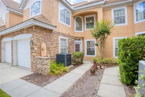 Photo of 7330 Cypress Grove Road #74, Orlando, FL 32819 (MLS # O6405848)
