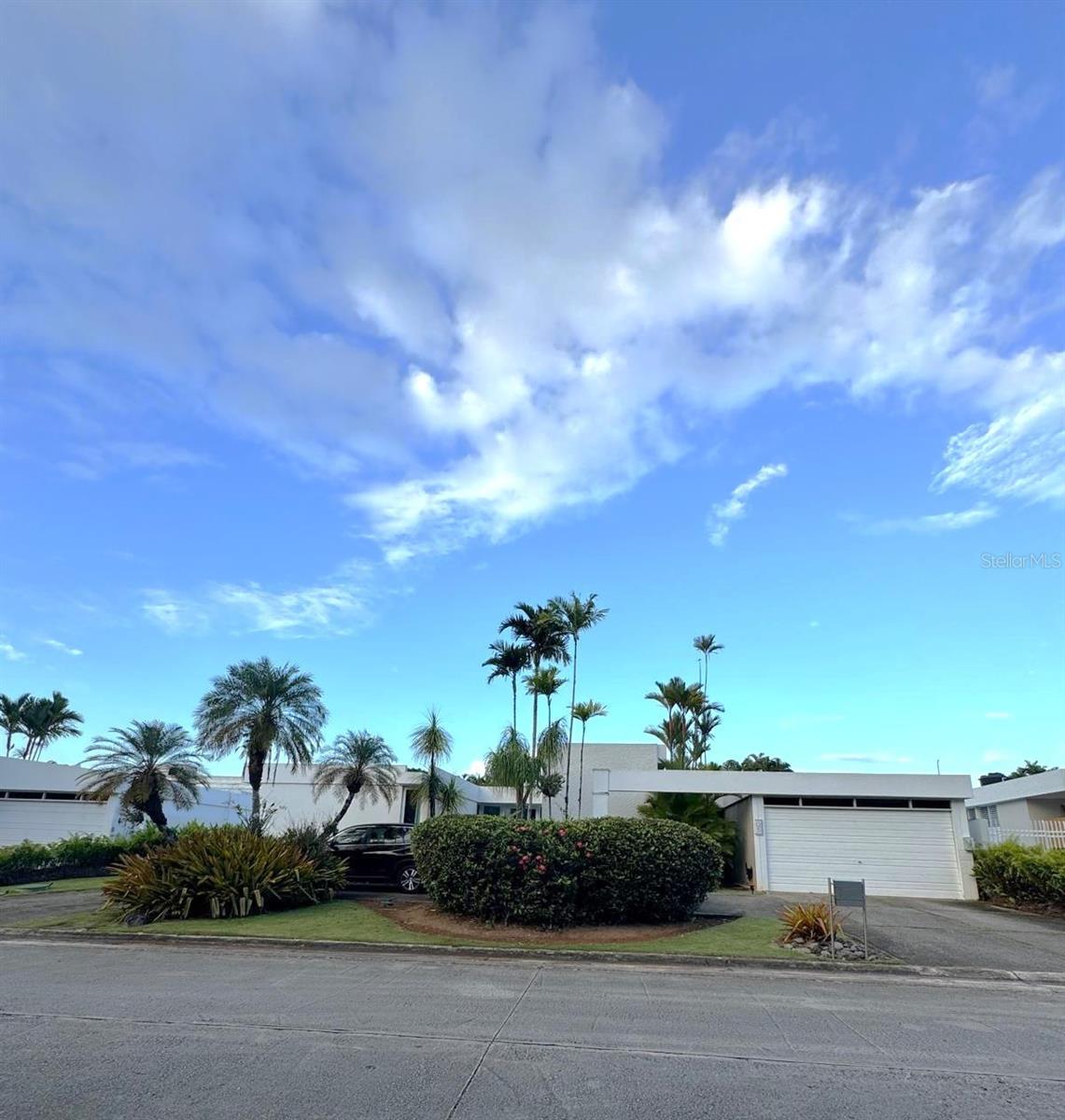 Explore the beauty of Parques de Santa Maria in San Juan. Modern and elegant, this property has plenty of natural light and breathing room for the whole family.This unique 3,850 square foot home is located in an exclusive dual access control community, which offers 24/7 security, renovated tennis courts and playground. The open concept features high ceilings, skylights, abundant natural light, ample spaces and a beautiful terrace. It has 5 bedrooms and 3.5 bathrooms, offering a large space for a growing family.
The property is equipped with solar panels, water cistern and electric generator fully covering the power for the house, ensuring autonomy and tranquility at all times. Enjoy the convenience of nearby parks, private schools, and quick access to Expreso Las Americas, making this home the perfect blend of privacy and accessibility.