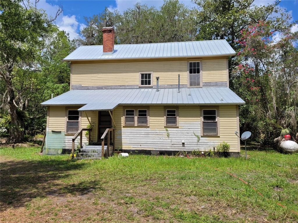Photo of 801 NE 1st Street, Micanopy, FL 32667 (MLS # O6426072)