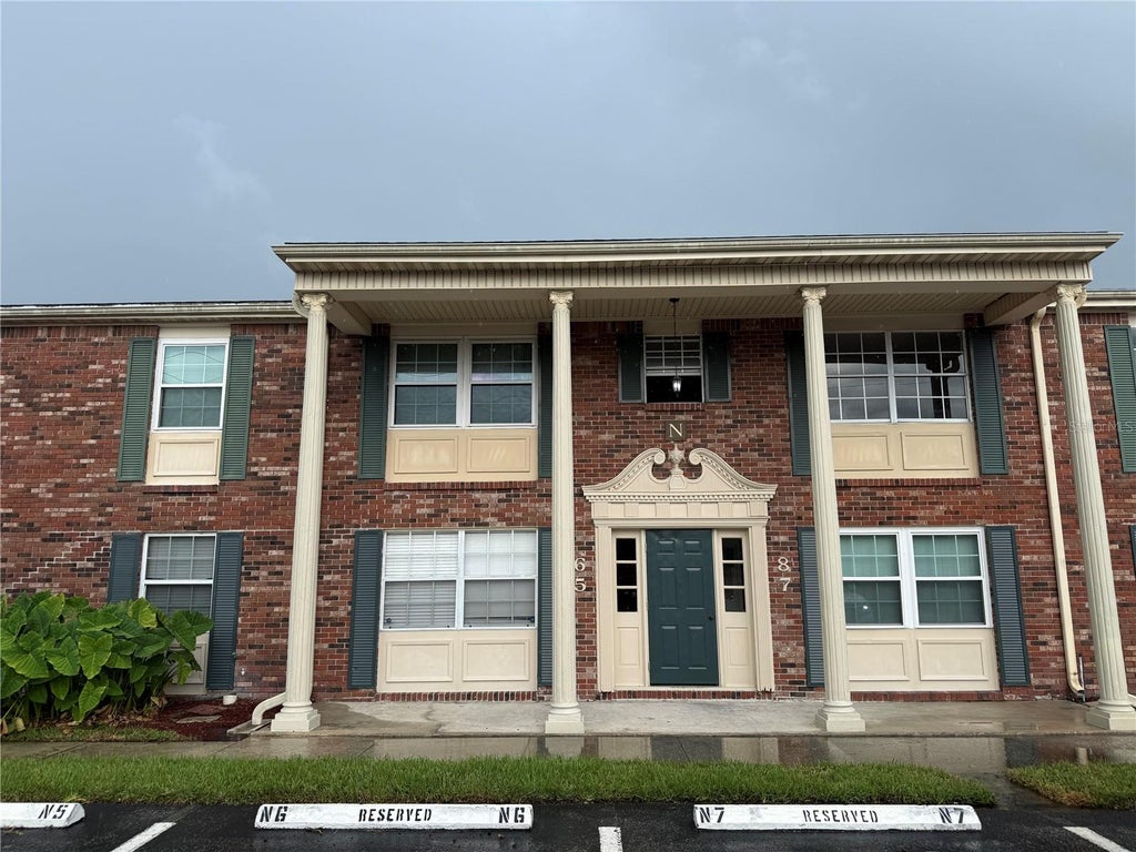 Photo of 1920 E Edgewood Drive #N8, Lakeland, FL 33803 (MLS # B4902364)