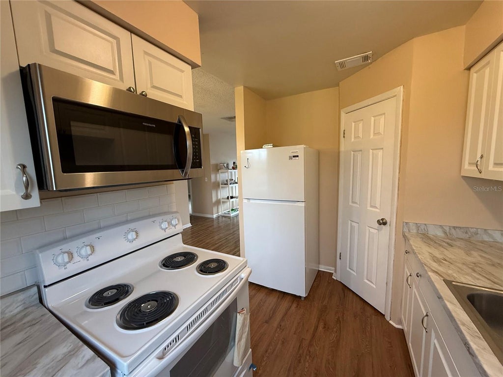 Photo of 1920 E Edgewood Drive #N8, Lakeland, FL 33803 (MLS # B4902364)