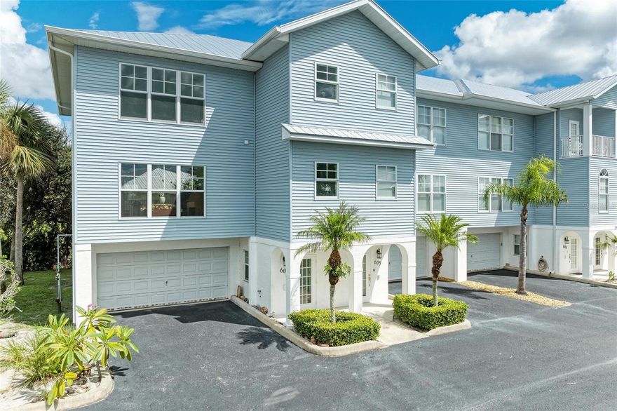 Discover this beautifully remodeled three-story end unit townhome, ideally situated in the most sought-after building of the complex. Enjoy unparalleled privacy as you bask in the serene surroundings of lush preserve land enveloping your home. This stunning retreat offers both comfort and a breathtaking natural backdrop for your enjoyment! COMPLETELY REMODELED ITS LIKE BUYING BRAND NEW 3 BEDROOMS, 3 BATHROOMS, OVER-SIZED 2 CAR GARAGE MAGNIFICENT TOWNHOUSE that Features 2900 sqft UNDER ROOF and ALL PRIVATE ELEVATOR-60,000$ UPGRADE! Spacious all screened in Balcony on the second floor and same size LANAI on the first floor! BRAND NEW  Metal ROOF! BRAND NEW AC! BRAND NEW ALL HURRICANE RESISTANT WINDOWS and DOORS! ALL NEW Upgraded Lighting Fixtures and Ceiling Fans! High Ceilings throughout! Freshly painted inside and outside! All Brand new carpet and all upgraded bathrooms! Great Room, Dining room, Beautiful kitchen with abundant cabinetry, CORIAN  COUNTERTOPS, APPLIANCES ALL INCLUDED! This Stunning home offers an OPEN FLOOR PLAN and INSIDE Laundry ROOM with WASHER and DRYER INCLUDED! Spacious MASTER SUITE with WALKING CLOSETS AND STUNNING CORAL CREEK NATURAL PRESERVE VIEW! Large master bath with extra built in cabinets for storage! Guest Suite with bathroom for convenience! Spacious all tiled balcony with lots of privacy and great relaxing time and overview of all private Coral Creek Nature Preserve! MAINTENANCE FREE LIVING with LOW HOA FEES! And, NO CDD! Priced to sell today! Excellent Location for your dream Florida Lifestyle! Only minutes to Famous BOCA GRAND BEACH & MANASOTA BEACH & BEST TARPON FISHING, 3 FULL SERVICE MARINA, GORGEOUS GOLF COURSES, GREAT RESTAURANTS AND ENTERTAINMENT! Call for your private showing today and own this beautiful piece of paradise! Life is beautiful-join this young active community and start living to the fullest!