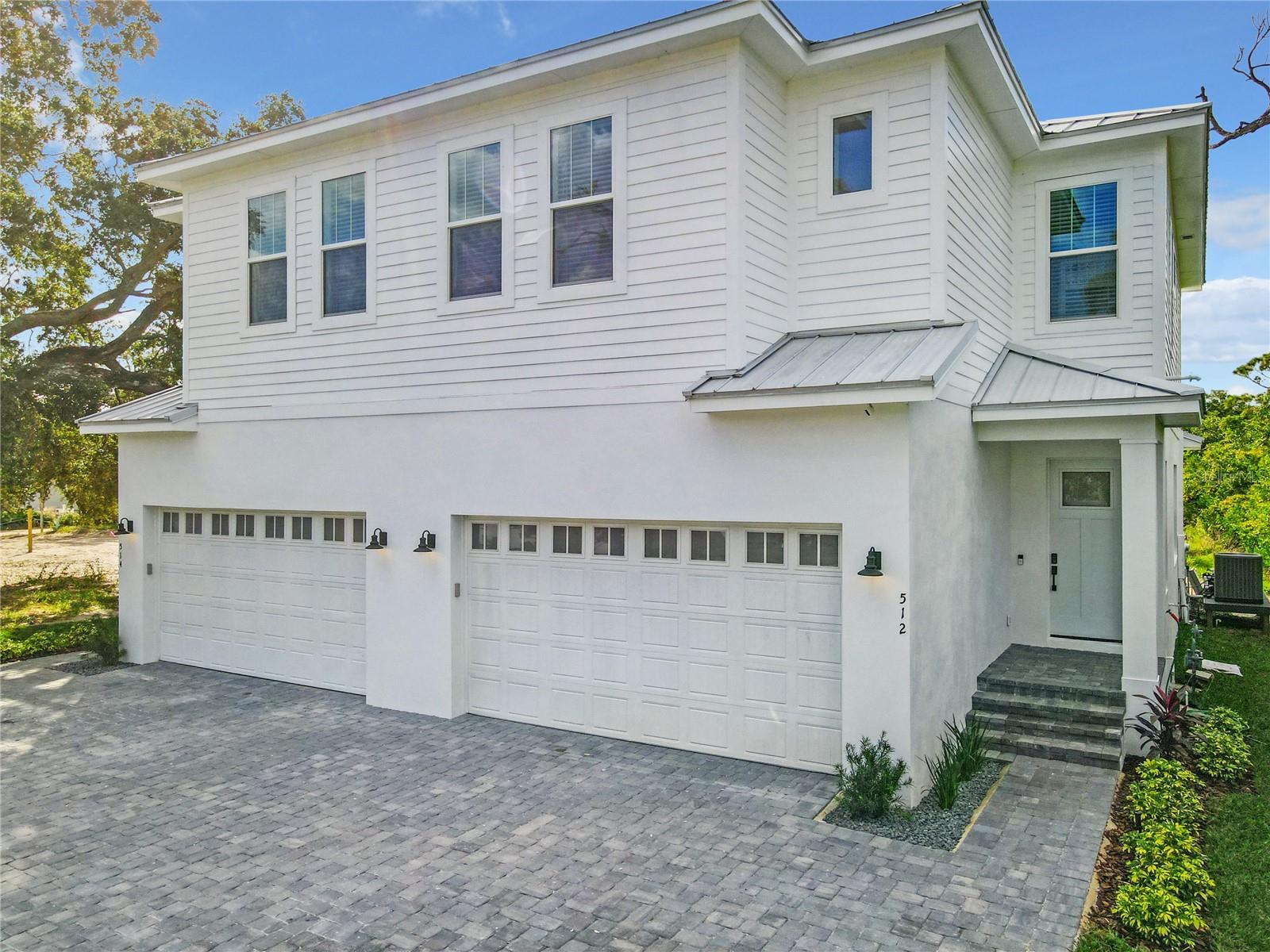 Come spend a month or several months/year with us in this Brand new.. 3 bedroom 3.5 bath plus loft, 2 car garage and fully furnished with private pool and boat slip on property included with rental up to 30 ft boat. . Only 2 blocks from Flagler and half mile to beach ramp. If you’re looking for a family-friendly place beachside in New Smyrna Beach with a private pool, this is the place! The spacious bi-level duplex has a wonderful open floor plan, lots of natural light, and features all the amenities to make you feel at home. In addition to the 3 bedrooms, there is a loft for additional sleeping space pull out couch) or a lounge area. You will love the quiet neighborhood and the home’s proximity to the beach, restaurants, and attractions. Also, it’s a short walk to Flagler Ave that has everything you could need, and the closest beach walkway is only ½ mile away! The property boasts a fantastic feature that sets it apart from other New Smyrna Beach – A private boat slip can accommodate boats up to 30 ft! This provides a great opportunity to explore the surrounding waterways (part of the most bio-diverse estuary in all of North America) and enjoy various aquatic activities. The boat slip comes equipped with electric and water hookups, making it effortless to prepare and maintain your vessel. The location is one of the best of NSB, close to everything.