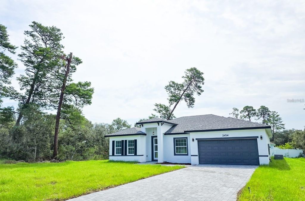 Photo of 2454 SW 167th Loop, Ocala, FL 34473 (MLS # O6386448)