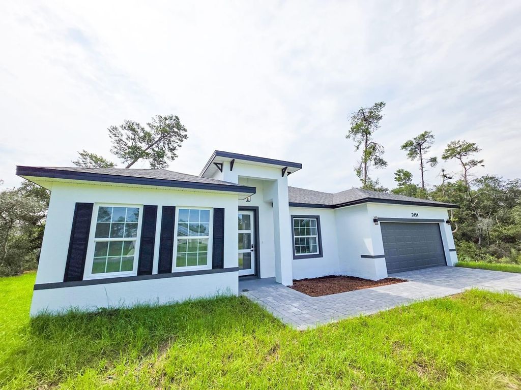 Photo of 2454 SW 167th Loop, Ocala, FL 34473 (MLS # O6386448)