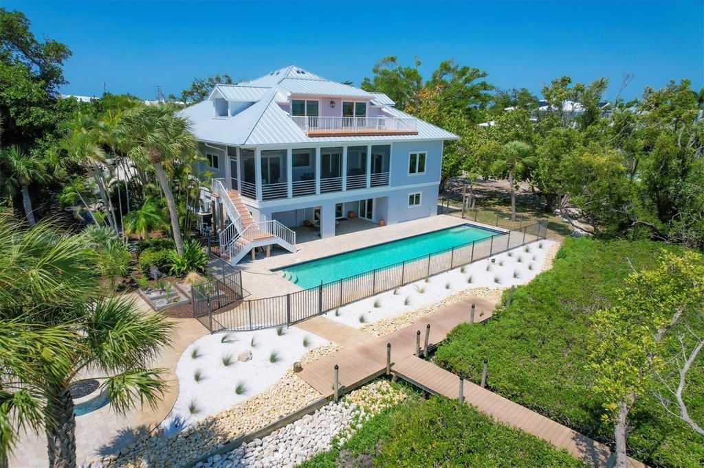 Photo of 19 Grouper Hole Drive, Boca Grande, FL 33921 (MLS # D6144445)