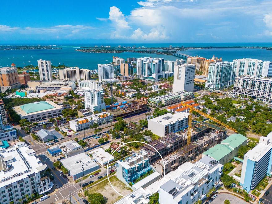 New construction, prime location and urban lifestyle. In Sarasota’s historic Rosemary District, just two blocks from The Bay Sarasota’s 53-acre waterfront park and Marina Jack - 5-10 minutes to downtown Main Street’s culinary delights, boutiques, Starbucks, Whole Foods and Saturday Farmers Market, arts and culture. Ride the free Bayrunner Trolley along Main Street to St. Armands Circle and Lido Beach. No car needed for your new urban lifestyle! Community and architecture, boutique six-unit condominium building with designer aqua blue exterior. Contemporary architecture with solid construction, impact rated windows and sustainable design. Generous 1.5-car garage plus private terraces, gated ground-floor lobby, amenities such as elevator access, gym, rooftop terrace, and media/conference room. Reflects Sarasota’s urban infill philosophy, live luxuriously in an accessible environment. Loft unit highlights, 2,325 square feet, three bedrooms, three baths  plus entertainment room with wet bar and wine cooler, and huge rooftop terrace for city views and stargazing! With 20-foot ceilings, floating staircase, floor-to-ceiling glass. Five private patios. Private elevator, high-end finishes and huge entertaining kitchen with all wood cabinetry, welcoming island, and dry bar including Bosch & Frigidaire stainless steel appliances and convection wall oven. Garden unit also available, and highlights are 1,468 square feet, three bedrooms, two baths and Zen courtyard with 27-by-15-foot private garden and patio. Soaring 14-foot ceilings, floor-to-ceiling windows and designer finishes. Oversized island kitchen, solid wood cabinetry, pantry, quartz countertops, and stainless steel Bosch and Frigidaire Gallery appliances, including convection oven. All properties have private 1.5-car garage with direct entry off alley north of the building. Designed for modern living. Ideal for millennials and empty nesters who value design, accessibility, culture and coastal living. Exceptional investment in Sarasota’s thriving downtown renaissance. Lock and leave. Simply Sarasota. Vista Urbana is your stylish gateway to a sophisticated lifestyle choice of the best of Sarasota.
***Also available with the furnished package as shown.***