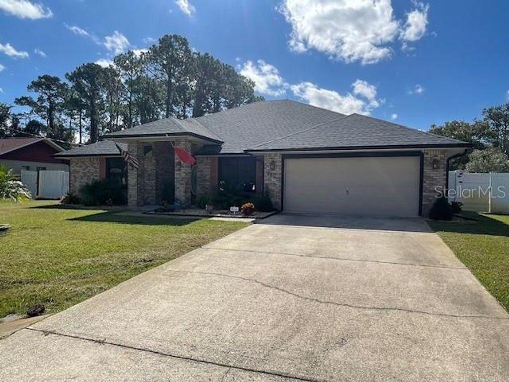 Photo of 129 Fort Caroline Lane, Palm Coast, FL 32137 (MLS # FC311634)