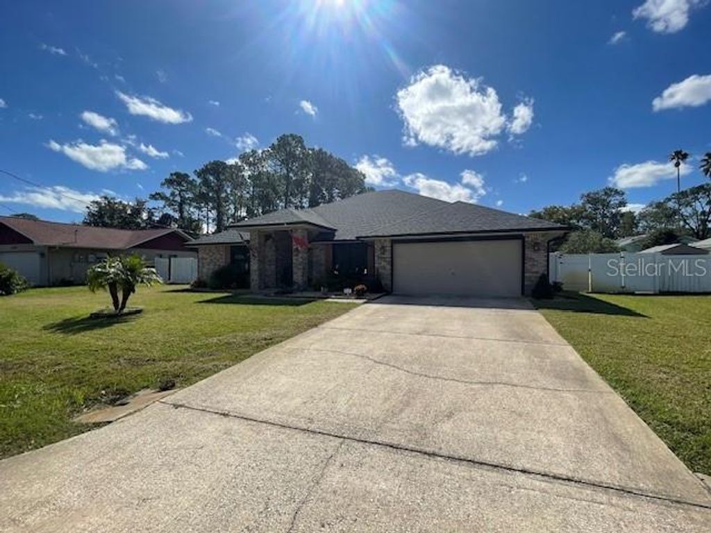 Photo of 129 Fort Caroline Lane, Palm Coast, FL 32137 (MLS # FC311634)