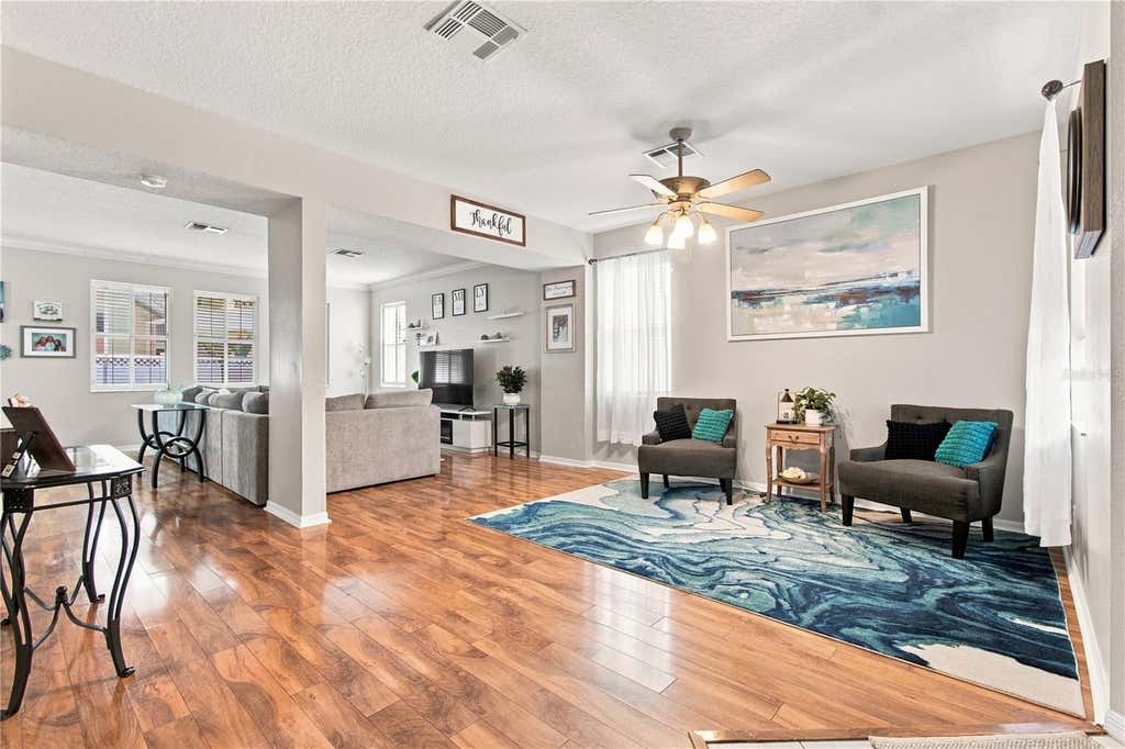 Photo of 2340 Spring Hollow Loop, Wesley Chapel, FL 33544 (MLS # TB8540715)