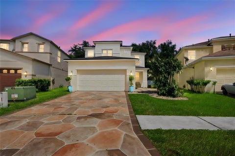 Photo of 2340 Spring Hollow Loop, Wesley Chapel, FL 33544 (MLS # TB8540715)