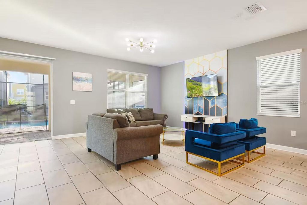 Photo of 4550 Narrative Lane, Kissimmee, FL 34746 (MLS # O6371543)