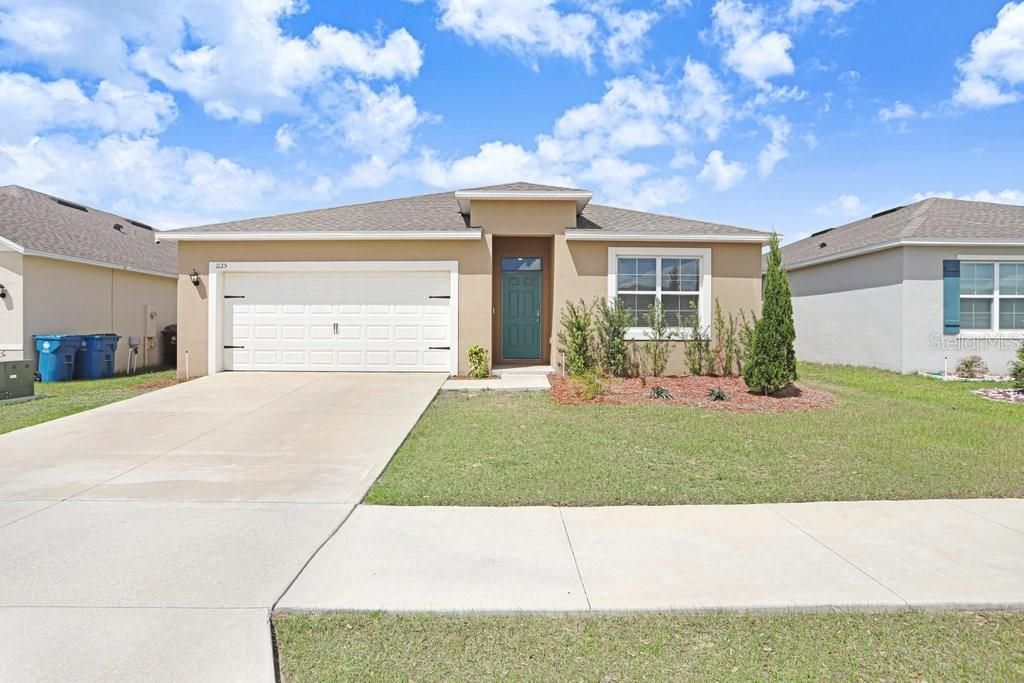 Photo of 1125 Torrente Lane, Haines City, FL 33844 (MLS # TB8494107)