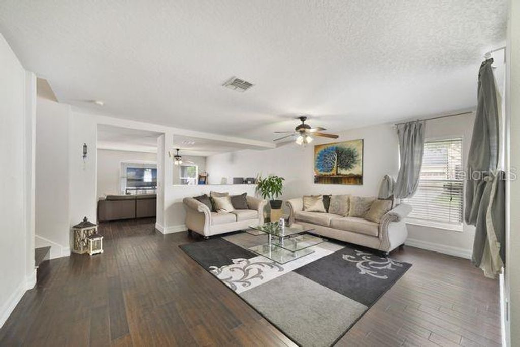 Photo of 14444 Jamaica Dogwood Drive, Orlando, FL 32828 (MLS # O6398307)