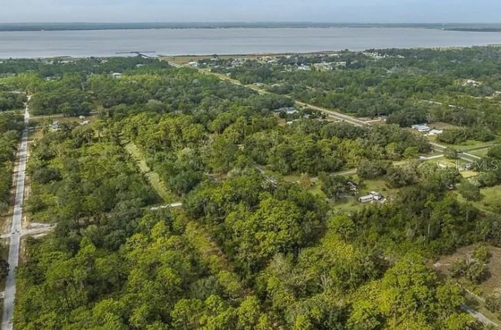 Photo of 915 Indian Lake Drive, Indian Lake Estates, FL 33855 (MLS # O6270033)