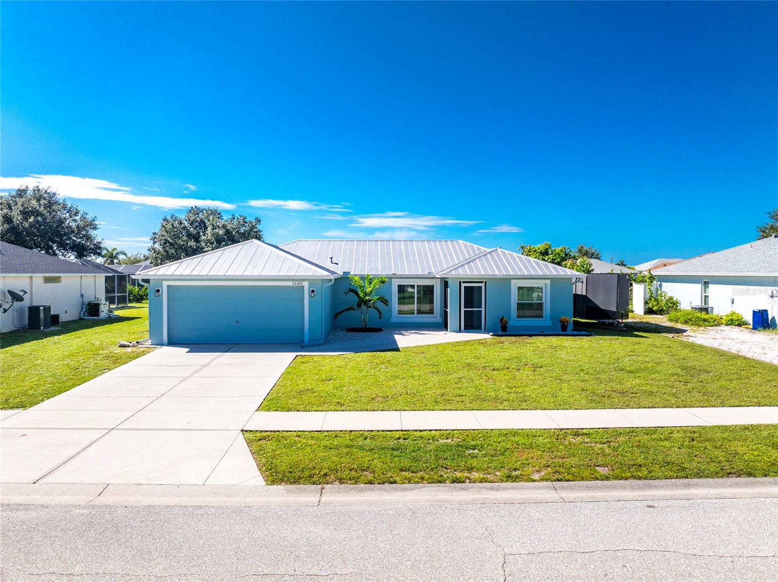 Welcome to this beautifully updated 3-bed, 2-bath pool home with a split floor plan and an open kitchen that flows into a bright, airy living space. The master suite opens directly to the pool area, creating easy indoor–outdoor living. Freshly painted inside and out, it features all-new landscaping with irrigation, a 2018 metal roof, 2019 HVAC, impact windows, and new LVP bedroom floors. Step outside to your private backyard retreat — an oversized, heated pool with soothing waterfalls and a whisper-quiet, energy-efficient variable-speed pump. The brand-new no-see-um screen enclosure keeps the space breezy and bug-free, while the spacious backyard offers plenty of room for entertaining or relaxing. Enjoy sidewalk-lined streets, two community pools, a clubhouse with fitness and game rooms, and courts for tennis, pickleball, bocce, and more. Nearby are boat ramps, fishing piers, golf courses, shops, and restaurants, along with the sandy beaches of Manasota Key and Boca Grande. Stroll Dearborn Street in Englewood, or take a quick drive to Ft. Myers or Sarasota for city conveniences and regional airports—perfect for a coastal lifestyle with easy Gulf Coast access.