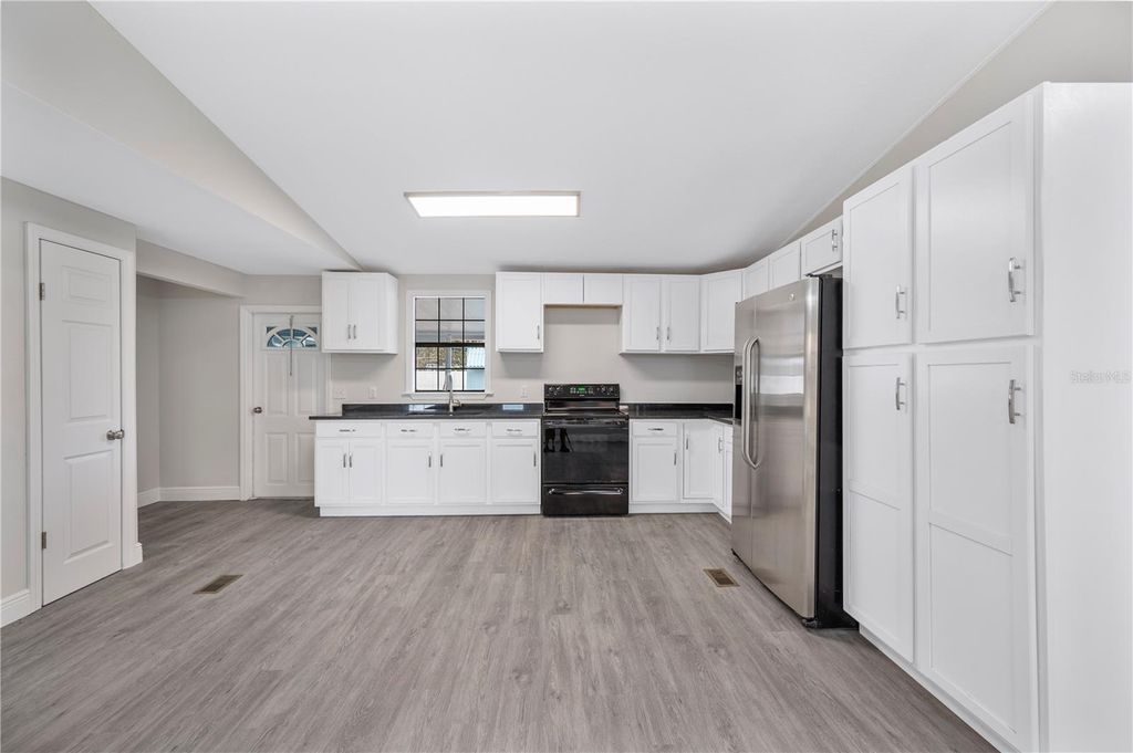 Photo of 217 Clearwater Avenue, Polk City, FL 33868 (MLS # TB8471397)