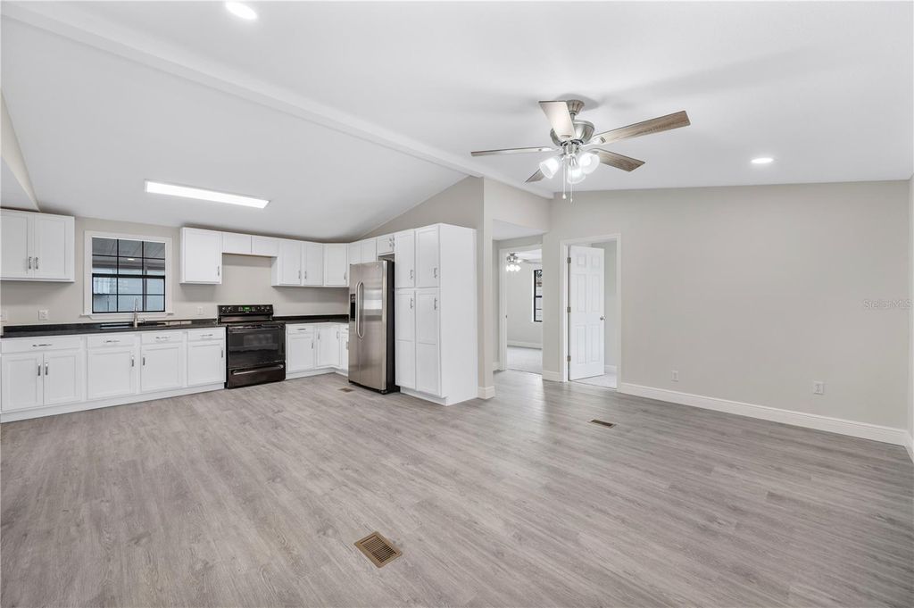 Photo of 217 Clearwater Avenue, Polk City, FL 33868 (MLS # TB8471397)