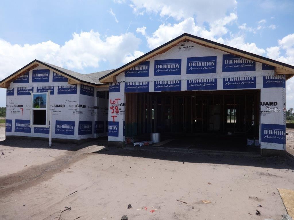 Photo of 7 SUMMERWOOD ROAD S, PALM COAST, FL 32137 (MLS # FC291222)