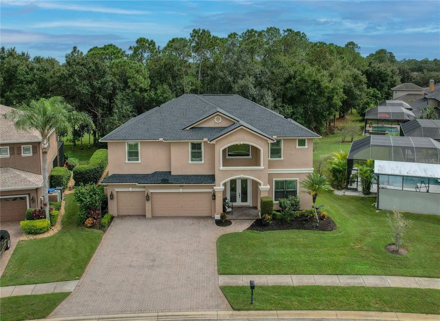 The Eagles near Westchase! NEW LISTING! Discover this CUSTOM-BUILT HOME by local builder LARSON (2013), positioned on a coveted GOLF COURSE LOT in this 24-hour guard-gated community! 
Discover UNPARALLELED LUXURY AND PRIVACY in this meticulously maintained 4,109 SQ FT RESIDENCE situated on the 5TH HOLE OF THE LAKES COURSE in Odessa’s exclusive 24-hour guard-gated Eagles community. PRIDE OF OWNERSHIP IS EVIDENT THROUGHOUT — THIS HOME HAS BEEN OWNED LONG TERM BY THE CURRENT OWNERS AND HAS NEVER BEEN A RENTAL. Nestled among MATURE TREES that provide exceptional seclusion from the golf course, this stunning 6-BEDROOM (5 BED + LARGE BONUS ROOM WITH CLOSET), 4-BATHROOM, 3-CAR GARAGE POOL HOME seamlessly blends elegant design with thoughtful functionality.

Enter through the inviting front of the home to discover a VERSATILE OFFICE and FORMAL DINING ROOM, perfect for both productivity and entertainment. CUSTOM CABINETRY AND COUNTERTOPS in the dining room add to the ease of hosting friends and family. The heart of the home features a sprawling FAMILY ROOM adorned with CROWN MOLDING THROUGHOUT THE ENTIRE FIRST FLOOR, creating an atmosphere of refined elegance. The GOURMET KITCHEN boasts a CUSTOM BREAKFAST NOOK with MOVABLE GRANITE-TOPPED TABLE, a LARGE CUSTOM PANTRY with PULL-OUT DRAWERS, and a NEWER DISHWASHER (2023). A SECOND PANTRY cleverly tucked under the staircase provides ABUNDANT STORAGE for the most discerning chef.

A rare FIRST-FLOOR IN-LAW SUITE WITH FULL BATHROOM offers flexibility for multi-generational living or hosting guests in comfort and privacy. The SOUTHEAST-FACING BACKYARD is an ENTERTAINER’S DREAM, featuring a HAYWARD SALINE SALT POOL and plenty of space for family and friends. There is a PROPANE TANK conveniently located near the kitchen for easy access. Surrounded by LUSH LANDSCAPING and MATURE TREES, this PRIVATE OASIS offers the perfect setting for FLORIDA LIVING while maintaining serene GOLF COURSE VIEWS.

As you walk up the stairway, you’ll find FOUR GENEROUSLY SIZED BEDROOMS and a LARGE BONUS ROOM, creating an exceptional second-floor retreat. The EXPANSIVE MASTER SUITE serves as a PRIVATE SANCTUARY, featuring a DEDICATED SITTING AREA with CUSTOM LIGHTING and TRAY CEILING WITH CROWN MOLDING. Each upstairs bedroom includes WALK-IN CLOSETS, while one bedroom showcases CUSTOM CLOSET SYSTEMS. The convenient SECOND-FLOOR LAUNDRY ROOM houses a WASHER AND DRYER that can convey with the home, and the BONUS ROOM WITH TRAY CEILING AND CROWN MOLDING provides ADDITIONAL LIVING SPACE and AMPLE STORAGE. A JACK AND JILL BATHROOM serves the secondary bedrooms, and all four bathrooms throughout the home are FULL BATHS.

Premium appointments include PLANTATION SHUTTERS THROUGHOUT, DUAL AC SYSTEMS for optimal comfort, and a WATER SOFTENER (2022). HURRICANE SHUTTERS are stored in the garage for peace of mind, and the SPRINKLER SYSTEM maintains the beautiful landscaping. SELECT FURNITURE IS NEGOTIABLE, making your move even easier.

With LOW HOA FEES ($129/MONTH) and NO CDD FEES, The Eagles offers exceptional value.

This home is zoned for HIGHLY-RATED SCHOOLS including MARY BRYANT ELEMENTARY, FARNELL MIDDLE, AND SICKLES HIGH SCHOOL, and is just minutes from Racetrack Road, Tampa International Airport, and Florida’s world-renowned beaches.

Schedule your private showing today!