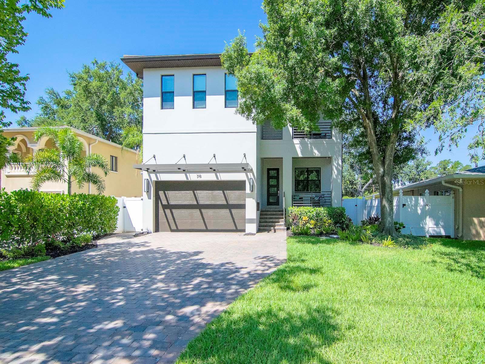 Under contract-accepting backup offers. Davis Islands Pool home. Built by Devonshire in 2016 with 4 bedrooms + den, 4 bath, and 2 car garage. As you enter from the covered front porch into a great foyer with 10 ft ceilings, you find the den /office at the front of the home. Next, you will see the open floor plan with a great kitchen filled with white shaker cabinetry,, large island, walk-in pantry, butler's pantry, and a great breakfast nook as well. The kitchen also features gas range w/oven, and all stainless appliances including beverage cooler & microwave. The large family room has plenty of space and light, and it overlooks a great covered porch. The first level does include a full bath with access from the exterior to function as a pool bath and powder room. Entering from the 2 car garage you will find a "Mud room/drop zone" as well. The second level features a huge master suite, with a large walk-in closet, complete with built-ins, finished off with a huge master bath, including double vanities, make-up area, separate shower with separate shower heads, and a free standing tub. On this floor you have another bedroom suite with walk-in closet, outfitted with a Murphy bed, two additional bedroom sharing a Jack-n-Jill bath, a large laundry room with built-ins and a sink, and to top it off a nice covered balcony at the front of the home. The backyard features a heated pool and spa, with paver decking surround, nice mature privacy landscaping, north side of home with turf, all overlooked by a large porch with electric screens & a built in outdoor kitchen. Additional: A multi-zone ceiling speaker system powered by Sonos - individual zones include master bedroom, master bathroom, living room, kitchen, pool/patio, and garage. Most rooms in the house are pre wired for speakers. Exterior has 4 CCTV cameras around the exterior. DVR and cameras will convey obviously, and includes remote access to DVR. The home has wood floors throughout, except for wet areas, 2 gas water heaters, 2 A/C systems, and it is in move in condition! Welcome to DI......