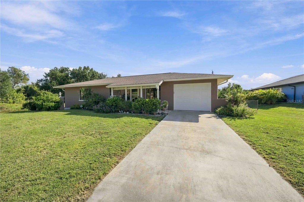 Photo of 7320 Yardley Street, Englewood, FL 34224 (MLS # D6149224)