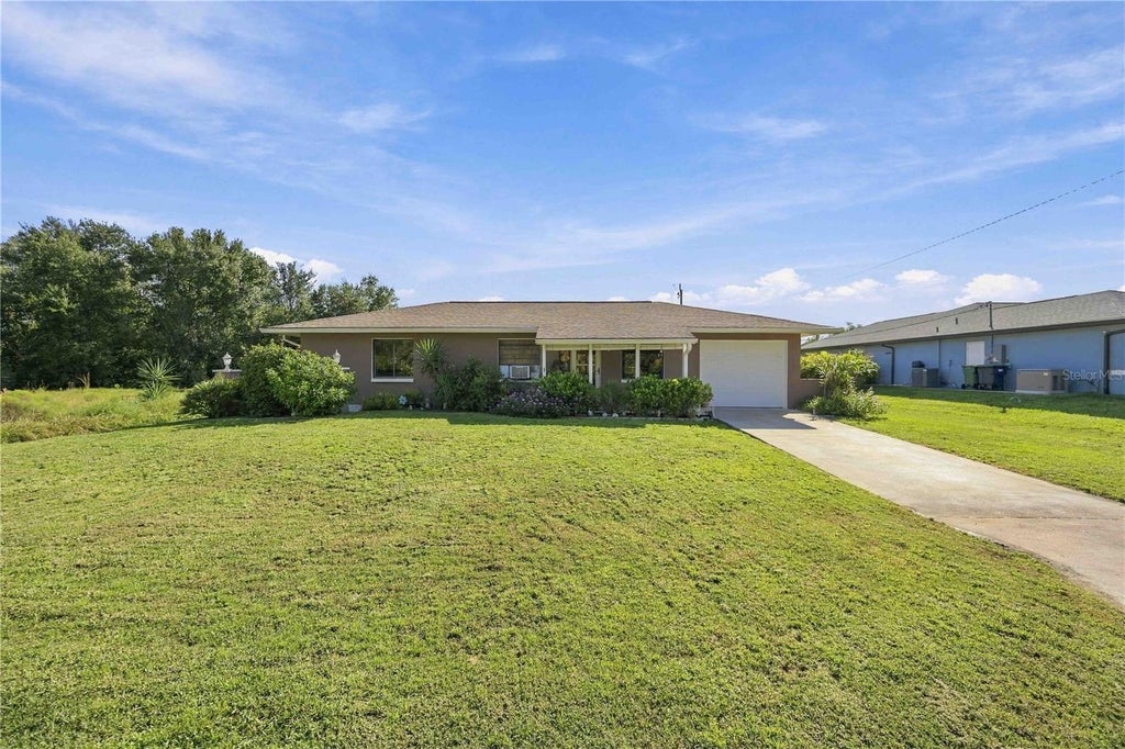 Photo of 7320 Yardley Street, Englewood, FL 34224 (MLS # D6149224)