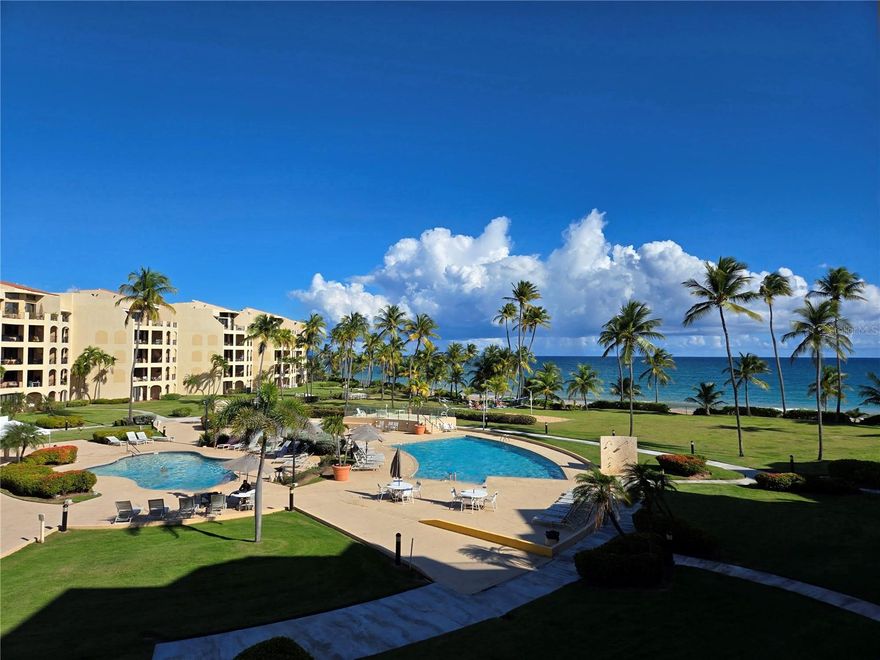 Located in the desirable Crescent Beach complex within the Palmas del Mar Resort in Humacao, this unit enjoys a frontal view of the complex’s swimming pools, recreational areas, and the beach. Crescent Beach is widely regarded as one of the best beachfront locations within Palmas del Mar, offering direct access to the sand and a truly resort-style setting. Surrounded by beautifully maintained grounds and close to golf courses, marina, restaurants, and walking trails, this property is ideal as a primary residence, vacation home, or investment opportunity.