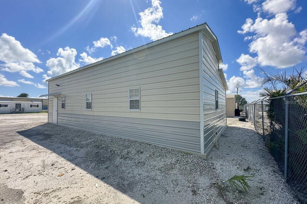 Photo of 2820 Avenue Of The Americas, Englewood, FL 34224 (MLS # D6146487)