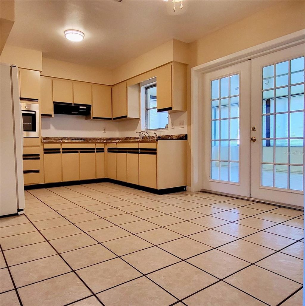 Photo of 7809 Lakeside Boulevard, Tampa, FL 33614 (MLS # TB8428313)