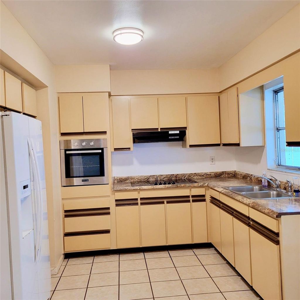 Photo of 7809 Lakeside Boulevard, Tampa, FL 33614 (MLS # TB8428313)