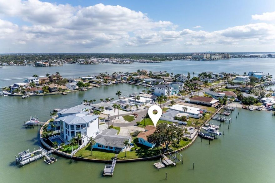 Bring Your Boat! Fish Off Your Own Private Dock! This beautiful updated Redington Beach Waterfront Open Floorplan home features 3 bedrooms, 3 bathrooms, dining room, living room, fully furnished and equipped for your stay and 2 car garage and dock with boat-lift and sweeping water views. Beautiful updates through out including kitchen with granite counters, light wood cabinets overlooking the bay. The town residents enjoy the private beach parking and access! This home is in the heart of Redington Beach and all that the beach life has to offer. John's Pass , lots of restaurants and all the fun are close by, Plus easy access to Tampa as well. Private Beach parking and access included. Non Smoking home. Small Pet considered. Private Property Management.