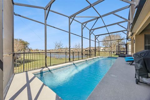 Photo of 901 Fountain Coin Loop, Orlando, FL 32828 (MLS # O6380417)